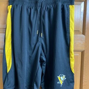 Pittsburgh Penguin team issued men’s XL workout shorts.